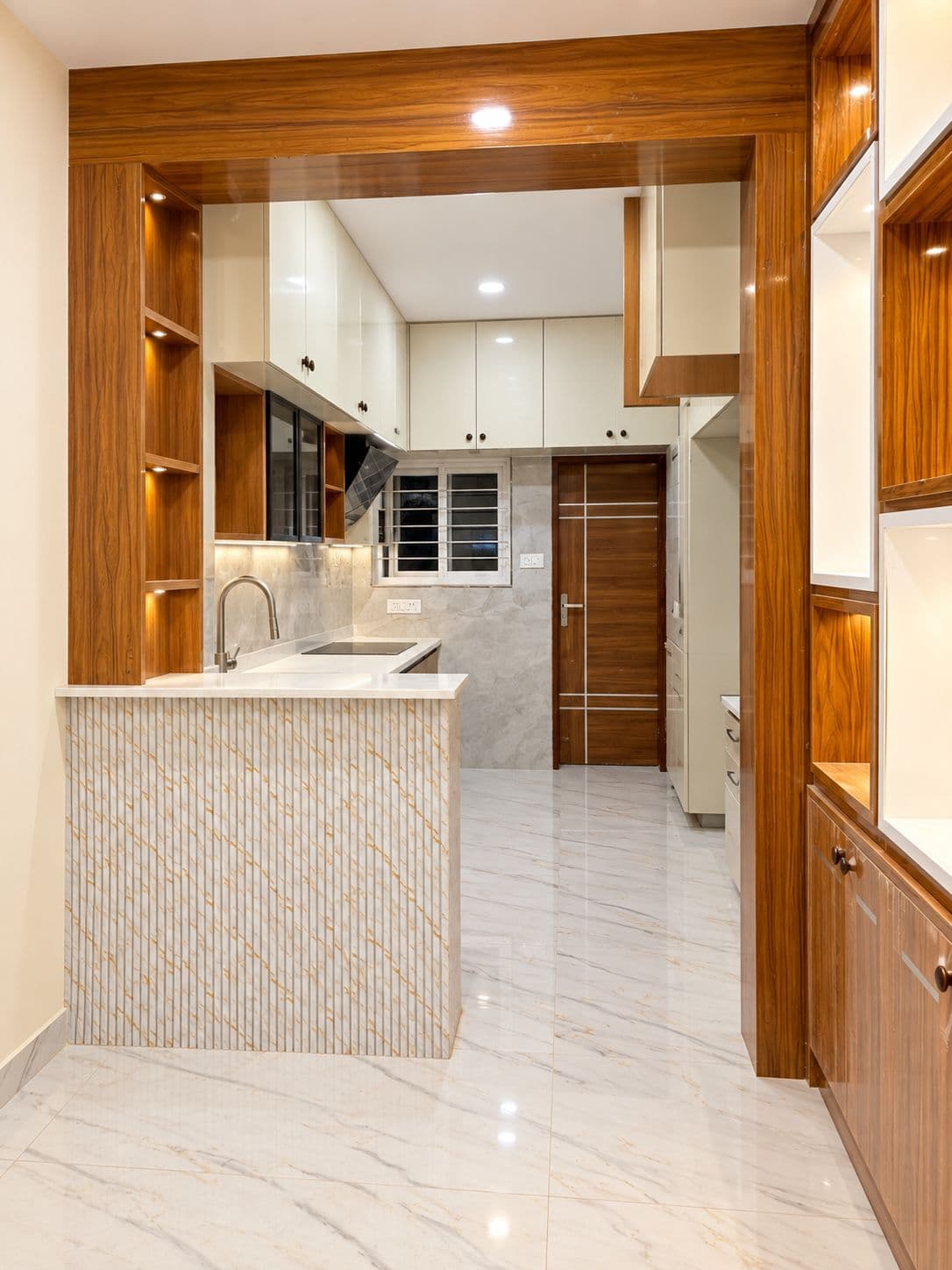 Timber-framed entrance to a kitchen with a marble-look counter